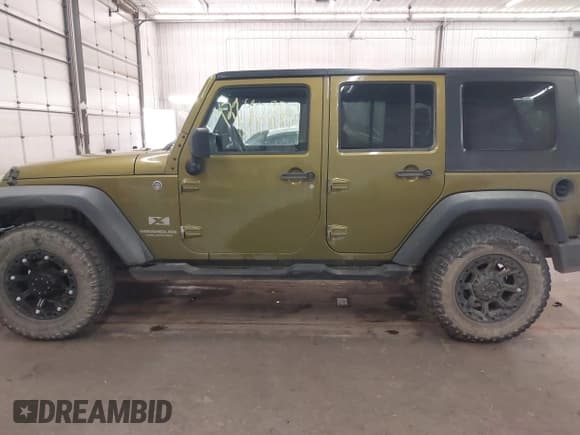 ✅ 2007 Jeep Wrangler X • VIN: 1J4GA391X7L157420 • Lot: 42940955. Listed on IAAI with 143,867 mi. Free auction sales archive from the USA and detailed vehicle history report at DreamBid. Image 15.