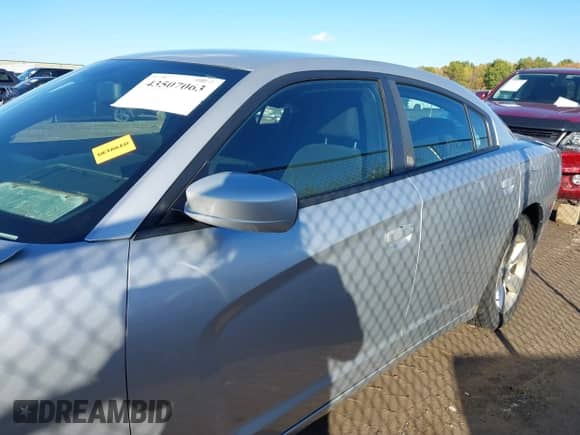 2012 Dodge Charger SE z VIN 2C3CDXBG3CH120772, wystawiony jako IAAI lot #43507063 z przebiegiem 224 409 mil mil oraz . Historia ofert i sprzedaży dostępna na DreamBid. Obrazek 14.