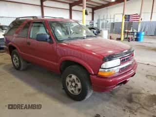 2003 Chevrolet Blazer LS z VIN 1GNCT18X13K165163, wystawiony jako Copart lot #78693034 z przebiegiem 159 770 mil mil oraz Szkoda całkowita • Salvage title. Historia ofert i sprzedaży dostępna na DreamBid. Obrazek 4.