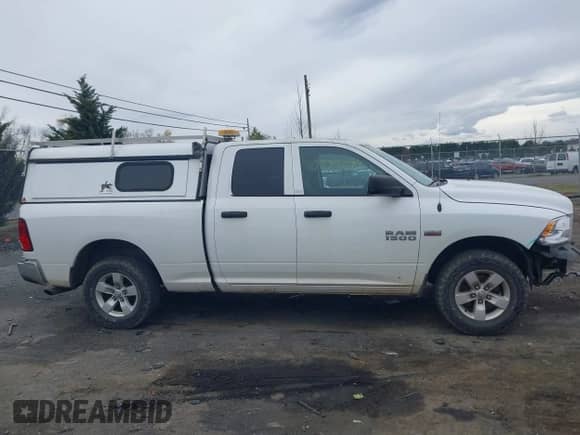2015 Ram 1500 Express with VIN 1C6RR7FT3FS710277, listed as a IAAI auction lot 40908699 with 173,736 mi miles and . Bid and sale history available at DreamBid. Image 13.