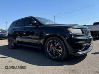 ✅ 2012 Jeep Grand Cherokee SRT-8 • VIN: 1C4RJFDJ2CC111226 • Lot: 74449424. Wystawiony na Copart z przebiegiem 113 515 mil. Bezpłatny archiwum sprzedaży aukcyjnych z USA i szczegółowy raport historii pojazdu na DreamBid. Zdjęcie 1.