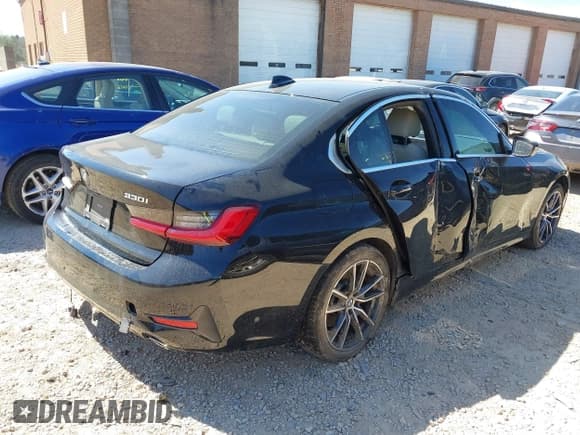 ✅ 2021 BMW 3 Series 330i • VIN: 3MW5R1J0XM8B69340 • Lot: 41864211. Listed on IAAI with 63,614 mi. Free auction sales archive from the USA and detailed vehicle history report at DreamBid. Image 4.