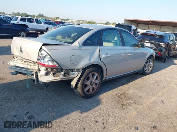✅ 2009 Mercury Sable Premier • VIN: 1MEHM42W69G614697 • Lot: 43121944. Listed on IAAI with 137,715 mi. Free auction sales archive from the USA and detailed vehicle history report at DreamBid. Image 4.