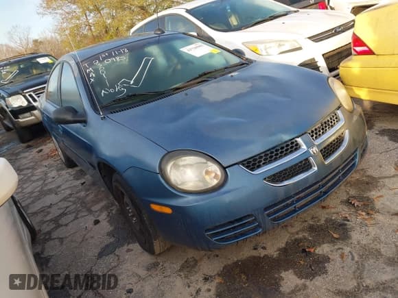 ✅ 2003 Dodge Neon SE • VIN: 1B3ES26C83D230011 • Lot: 43720985. Listed on IAAI with 263,182 mi. Free auction sales archive from the USA and detailed vehicle history report at DreamBid. Image 1.