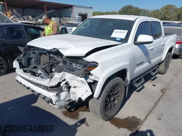 ✅ 2023 Toyota Tacoma SR5 • VIN: 3TYAZ5CN4PT042035 • Lot: 43435818. Listed on IAAI with 52,589 mi. Free auction sales archive from the USA and detailed vehicle history report at DreamBid. Image 2.
