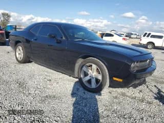 ✅ 2012 Dodge Challenger SXT • VIN: 2C3CDYAG7CH208635 • Lot: 87127114. Wystawiony na Copart z przebiegiem 122 342 mil. Bezpłatny archiwum sprzedaży aukcyjnych z USA i szczegółowy raport historii pojazdu na DreamBid. Zdjęcie 4.