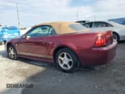 ✅ 2004 Ford Mustang Deluxe • VIN: 1FAFP44484F109180 • Lot: 53024575. Listed on Copart with 117,917 mi. Free auction sales archive from the USA and detailed vehicle history report at DreamBid. Image 2.