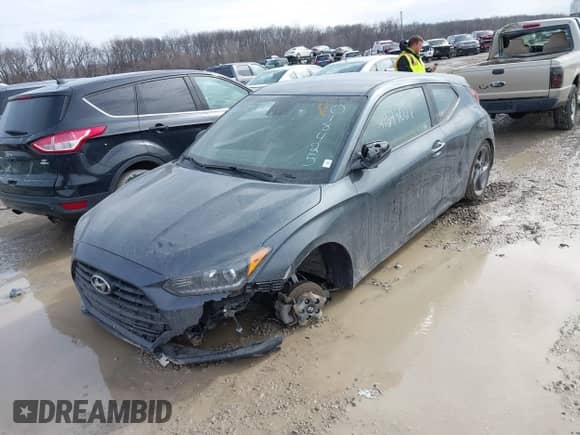 2019 Hyundai Veloster 2.0 z VIN KMHTG6AF2KU018425, wystawiony jako IAAI lot #41649027 z przebiegiem 67 155 mil mil oraz . Historia ofert i sprzedaży dostępna na DreamBid. Obrazek 2.