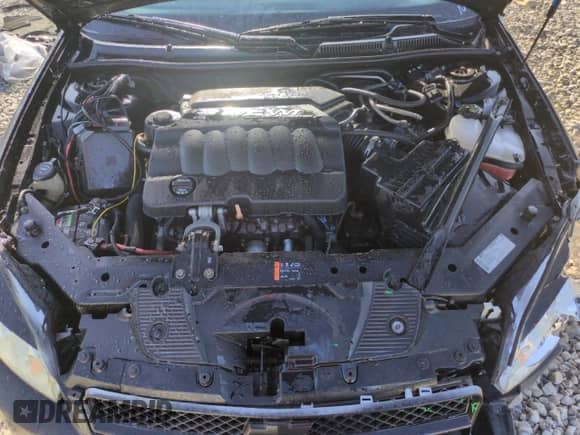 2013 Chevrolet Impala Police z VIN 2G1WD5E3XD1162414, wystawiony jako Copart lot #53910565 z przebiegiem 146 081 mil mil oraz Szkoda całkowita • Salvage title. Historia ofert i sprzedaży dostępna na DreamBid. Obrazek 11.