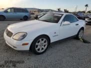 ✅ 2000 Mercedes-Benz SLK 230 Kompressor • VIN: WDBKK47F8YF169677 • Lot: 88743035. Listed on Copart with 141,680 mi. Free auction sales archive from the USA and detailed vehicle history report at DreamBid. Image 1.