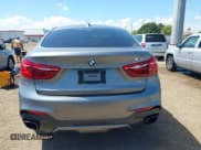 ✅ 2015 BMW X6 xDrive50i • VIN: 5UXKU6C54F0F93945 • Lot: 43042471. Listed on IAAI with 52,434 mi. Free auction sales archive from the USA and detailed vehicle history report at DreamBid. Image 16.
