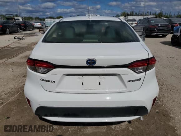 ✅ 2022 Toyota Corolla Hybrid LE • VIN: JTDEAMDE1N3011711 • Lot: 90301755. Wystawiony na Copart z przebiegiem 20 759 mil. Bezpłatny archiwum sprzedaży aukcyjnych z USA i szczegółowy raport historii pojazdu na DreamBid. Zdjęcie 6.