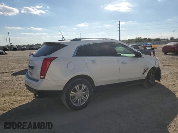 ✅ 2010 Cadillac SRX Luxury Collection • VIN: 3GYFNAEY1AS582078 • Lot: 87105905. Wystawiony na Copart z przebiegiem 128 304 mil. Bezpłatny archiwum sprzedaży aukcyjnych z USA i szczegółowy raport historii pojazdu na DreamBid. Zdjęcie 3.