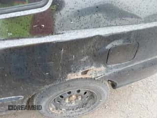 2000 Hyundai Accent z VIN KMHCF35G7YU015260, wystawiony jako IAAI lot #42322886 z przebiegiem 273 445 mil mil oraz . Historia ofert i sprzedaży dostępna na DreamBid. Obrazek 6.