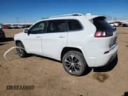 ✅ 2019 Jeep Cherokee Overland • VIN: 1C4PJMJNXKD142672 • Lot: 90723995. Listed on Copart with 85,288 mi. Free auction sales archive from the USA and detailed vehicle history report at DreamBid. Image 2.