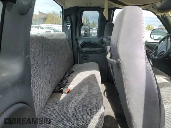 1999 Dodge 1500 с VIN 1B7HC13Z0XJ587556, выставлен на аукционе Copart как лот 76167934 с пробегом 80 107 миль миль и Списание • Salvage title. История ставок и продаж доступна на DreamBid. Изображение 10.