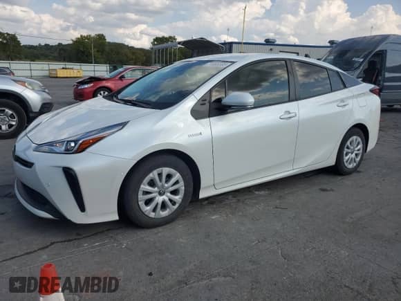 2021 Toyota Prius L Eco with VIN JTDKAMFU9M3139796, listed as a Copart auction lot 71665595 with 89,976 mi miles and Salvage title. Bid and sale history available at DreamBid. Image 1.