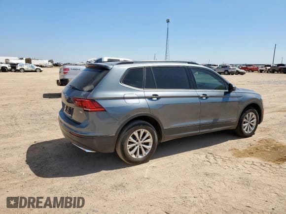 ✅ 2018 Volkswagen Tiguan S • VIN: 3VV1B7AX8JM070459 • Lot: 70947045. Listed on Copart with 150,564 mi. Free auction sales archive from the USA and detailed vehicle history report at DreamBid. Image 3.