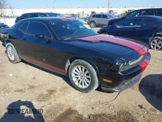 ✅ 2013 Dodge Challenger SXT • VIN: 2C3CDYAG5DH631358 • Lot: 41307511. Wystawiony na IAAI z przebiegiem 145 683 mil. Bezpłatny archiwum sprzedaży aukcyjnych z USA i szczegółowy raport historii pojazdu na DreamBid. Zdjęcie 1.