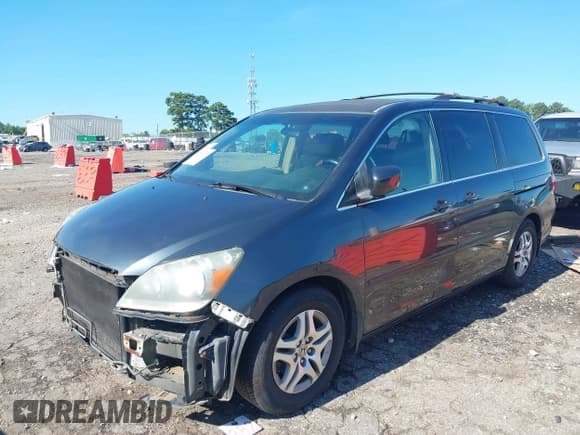 ✅ 2005 Honda Odyssey EX-L • VIN: 5FNRL38745B030919 • Лот: 42840538. Опубликован ранее на IAAI с пробегом 138 261 миль. Бесплатный доступ к архиву аукционных продаж из США и подробный отчёт об истории автомобиля на DreamBid. Изображение 6.