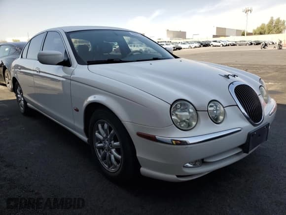 ✅ 2002 Jaguar S-Type • VIN: SAJDA01P92GM29630 • Лот: 62421225. Опубликован ранее на Copart с пробегом 75 686 миль. Бесплатный доступ к архиву аукционных продаж из США и подробный отчёт об истории автомобиля на DreamBid. Изображение 4.