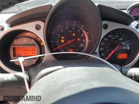 ✅ 2014 Nissan 370Z • VIN: JN1AZ4EHXEM636041 • Лот: 60835255. Опубликован ранее на Copart с пробегом 69 676 миль. Бесплатный доступ к архиву аукционных продаж из США и подробный отчёт об истории автомобиля на DreamBid. Изображение 9.