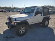 ✅ 2006 Jeep Wrangler X • VIN: 1J4FA39S56P770203 • Lot: 87086945. Listed on Copart with 128,489 mi. Free auction sales archive from the USA and detailed vehicle history report at DreamBid. Image 1.