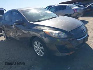 ✅ 2010 Mazda 3 i Touring • VIN: JM1BL1SGXA1156445 • Lot: 41858137. Listed on IAAI with 221,424 mi. Free auction sales archive from the USA and detailed vehicle history report at DreamBid. Image 1.