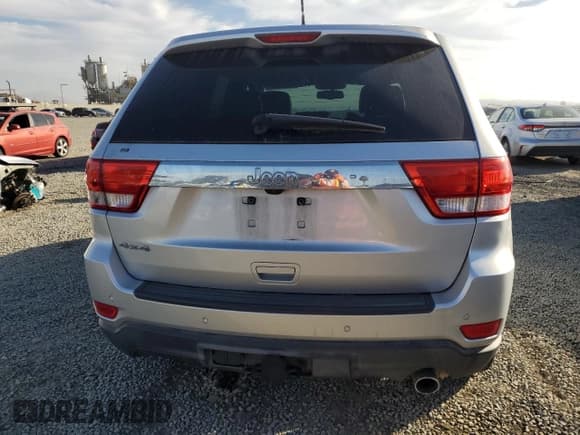 ✅ 2011 Jeep Grand Cherokee Laredo • VIN: 1J4RR4GG1BC666352 • Lot: 90954055. Listed on Copart with 171,907 mi. Free auction sales archive from the USA and detailed vehicle history report at DreamBid. Image 6.