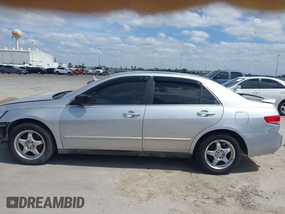 ✅ 2003 Honda Accord LX • VIN: 1HGCM66393A102094 • Lot: 41762701. Listed on IAAI with 171,002 mi. Free auction sales archive from the USA and detailed vehicle history report at DreamBid. Image 15.