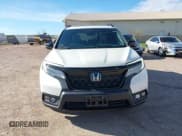 ✅ 2019 Honda Passport Elite • VIN: 5FNYF8H0XKB001472 • Лот: 42143890. Опубликован ранее на IAAI с пробегом 98 119 миль. Бесплатный доступ к архиву аукционных продаж из США и подробный отчёт об истории автомобиля на DreamBid. Изображение 13.