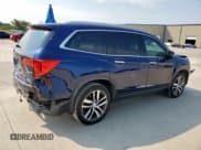 ✅ 2018 Honda Pilot Touring • VIN: 5FNYF5H94JB006212 • Lot: 70333075. Listed on Copart with 130,677 mi. Free auction sales archive from the USA and detailed vehicle history report at DreamBid. Image 3.