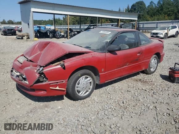 ✅ 1996 Saturn SC • VIN: 1G8ZF1281TZ216240 • Лот: 74964504. Опубликован ранее на Copart с пробегом 201 977 миль. Бесплатный доступ к архиву аукционных продаж из США и подробный отчёт об истории автомобиля на DreamBid. Изображение 1.