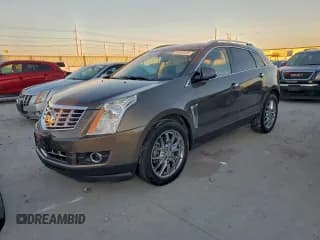 ✅ 2014 Cadillac SRX Performance Collection • VIN: 3GYFNCE3XES554060 • Lot: 94438435. Listed on Copart with 96,157 mi. Free auction sales archive from the USA and detailed vehicle history report at DreamBid. Image 1.