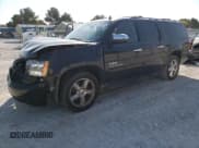 ✅ 2013 Chevrolet Suburban LT • VIN: 1GNSCJE09DR348922 • Lot: 74972334. Wystawiony na Copart z przebiegiem 108 275 mil. Bezpłatny archiwum sprzedaży aukcyjnych z USA i szczegółowy raport historii pojazdu na DreamBid. Zdjęcie 1.