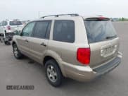 ✅ 2005 Honda Pilot EX-L • VIN: 5FNYF18535B053825 • Lot: 42482002. Listed on IAAI with 230,606 mi. Free auction sales archive from the USA and detailed vehicle history report at DreamBid. Image 3.