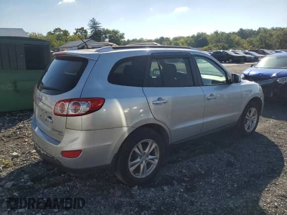 2011 Hyundai Santa Fe SE с VIN 5XYZHDAG7BG054119, выставлен на аукционе Copart как лот 70383354 с пробегом 159 800 миль миль и Списание • Salvage title. История ставок и продаж доступна на DreamBid. Изображение 3.