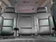 2015 Chevrolet Suburban LT z VIN 1GNSKJKC9FR282473, wystawiony jako Copart lot #86530615 z przebiegiem 192 642 mil mil oraz Czysty tytuł • Clean title. Historia ofert i sprzedaży dostępna na DreamBid. Obrazek 10.