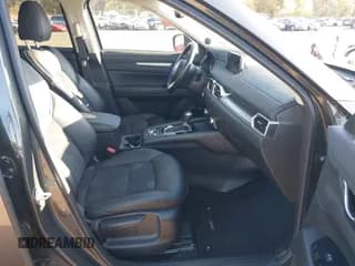 ✅ 2018 Mazda CX-5 Touring • VIN: JM3KFBCM4J0439728 • Lot: 43281341. Listed on IAAI with 98,516 mi. Free auction sales archive from the USA and detailed vehicle history report at DreamBid. Image 5.