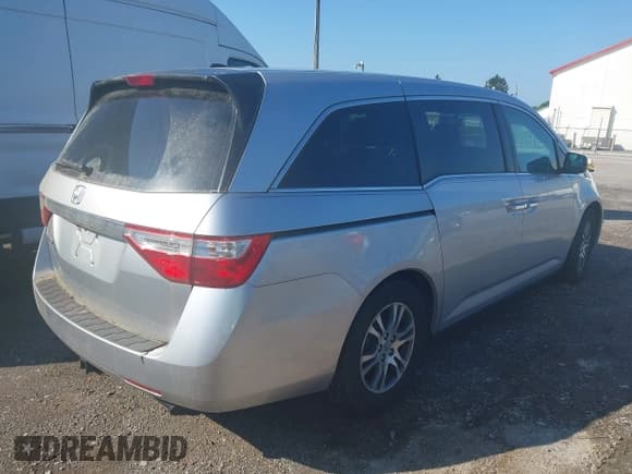 ✅ 2011 Honda Odyssey EX-L • VIN: 5FNRL5H6XBB057590 • Lot: 42481395. Listed on IAAI with 206,000 mi. Free auction sales archive from the USA and detailed vehicle history report at DreamBid. Image 4.