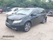 ✅ 2014 Honda Odyssey Touring • VIN: 5FNRL5H99EB005835 • Lot: 43210547. Listed on IAAI with 224,342 mi. Free auction sales archive from the USA and detailed vehicle history report at DreamBid. Image 2.