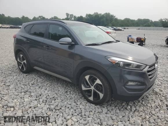 2018 Hyundai Tucson Value z VIN KM8J33A26JU784560, wystawiony jako Copart lot #61024255 z przebiegiem 111 219 mil mil oraz Czysty tytuł • Clean title. Historia ofert i sprzedaży dostępna na DreamBid. Obrazek 4.