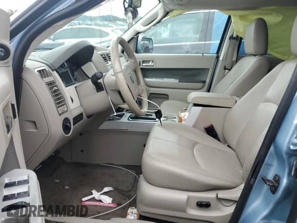 2009 Mercury Mariner Premier with VIN 4M2CU97709KJ02175, listed as a Copart auction lot 66205615 with 117,775 mi miles and Salvage title. Bid and sale history available at DreamBid. Image 7.