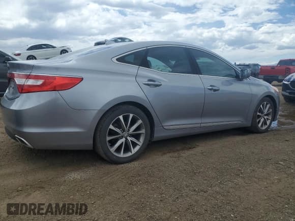 ✅ 2015 Hyundai Azera • VIN: KMHFG4JG7FA439963 • Lot: 57679575. Listed on Copart with 200,379 mi. Free auction sales archive from the USA and detailed vehicle history report at DreamBid. Image 3.