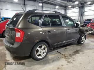 ✅ 2009 Kia Rondo LX • VIN: KNAFG528397269679 • Лот: 64802864. Опубликован ранее на Copart с пробегом 160 936 миль. Бесплатный доступ к архиву аукционных продаж из США и подробный отчёт об истории автомобиля на DreamBid. Изображение 3.