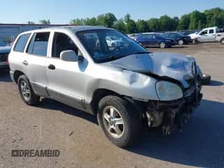 2004 Hyundai Santa Fe GLS z VIN KM8SC13E84U746977, wystawiony jako IAAI lot #42602571 z przebiegiem 172 498 mil mil oraz . Historia ofert i sprzedaży dostępna na DreamBid. Obrazek 1.