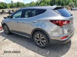 ✅ 2018 Hyundai Santa Fe Ultimate • VIN: 5XYZWDLA5JG505481 • Лот: 60621944. Опубликован ранее на Copart с пробегом 109 058 миль. Бесплатный доступ к архиву аукционных продаж из США и подробный отчёт об истории автомобиля на DreamBid. Изображение 2.