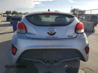 ✅ 2013 Hyundai Veloster Turbo • VIN: KMHTC6AEXDU128130 • Lot: 83827214. Wystawiony na Copart z przebiegiem 173 288 mil. Bezpłatny archiwum sprzedaży aukcyjnych z USA i szczegółowy raport historii pojazdu na DreamBid. Zdjęcie 6.