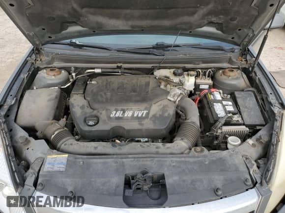 2009 Saturn Aura XR z VIN 1G8ZX577X9F119987, wystawiony jako Copart lot #67035455 z przebiegiem 179 054 mil mil oraz Szkoda całkowita • Salvage title. Historia ofert i sprzedaży dostępna na DreamBid. Obrazek 11.