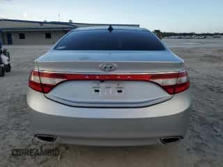 2013 Hyundai Azera z VIN KMHFH4JG2DA284166, wystawiony jako Copart lot #78656664 z przebiegiem 157 197 mil mil oraz Czysty tytuł • Clean title. Historia ofert i sprzedaży dostępna na DreamBid. Obrazek 6.